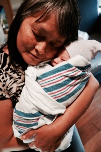 Grandma giving Bowie a birthday cuddle